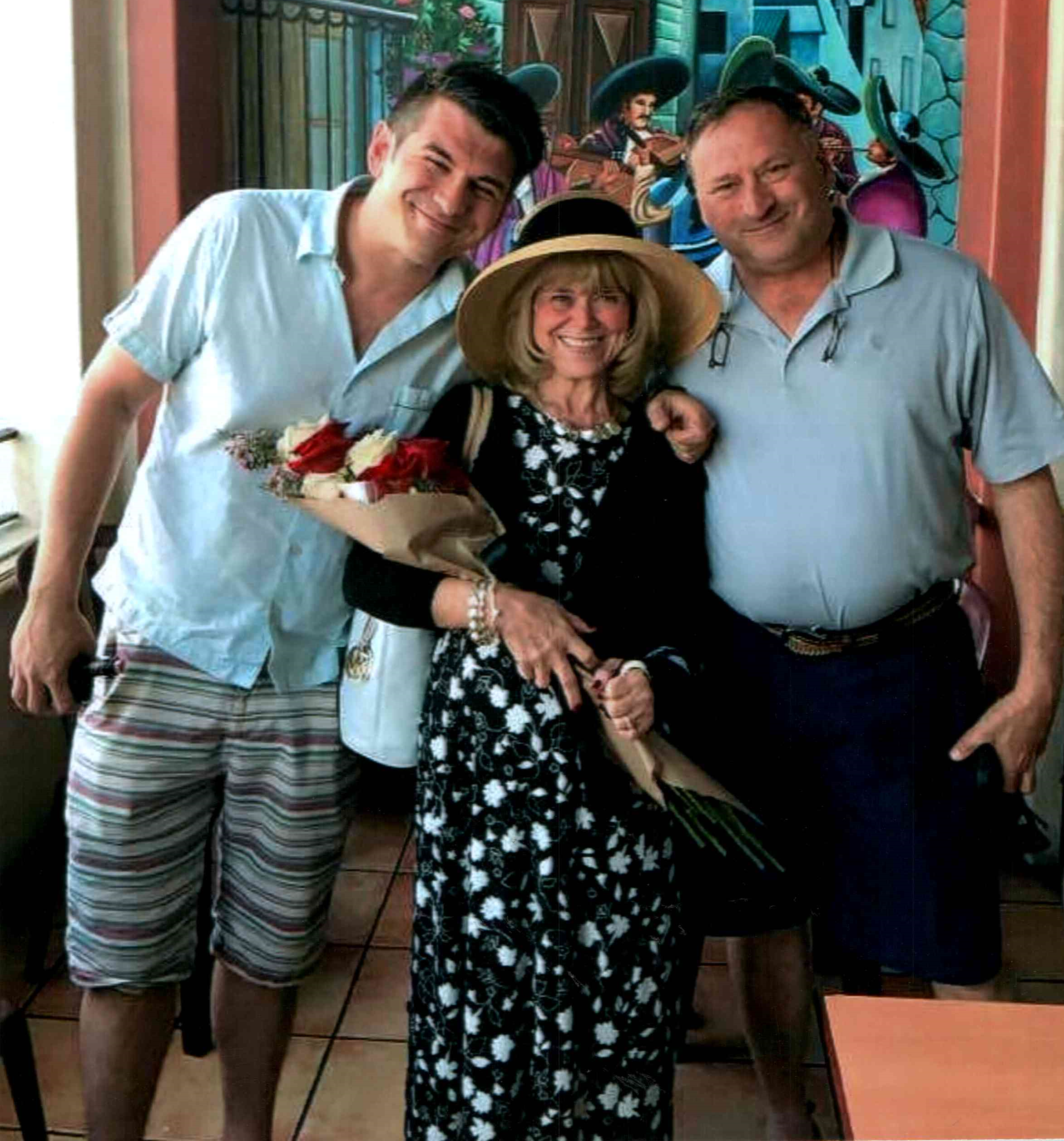 Joshua Glynn with his parents Matt and Karen